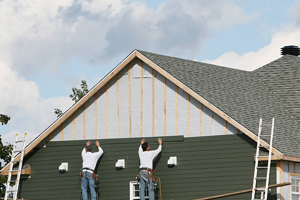 Professional Siding Installation technician working in Townville, PA